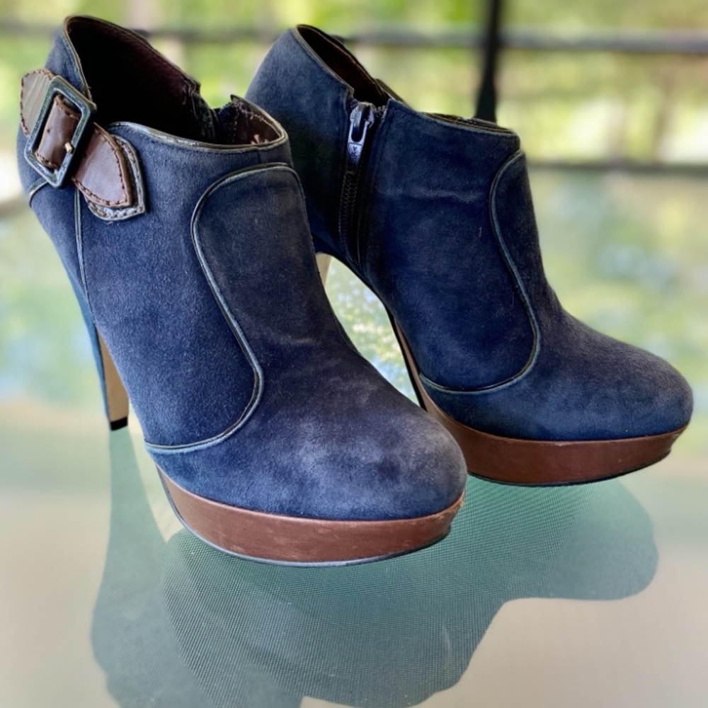 Elegant Navy Heeled Boots with Brown Trim